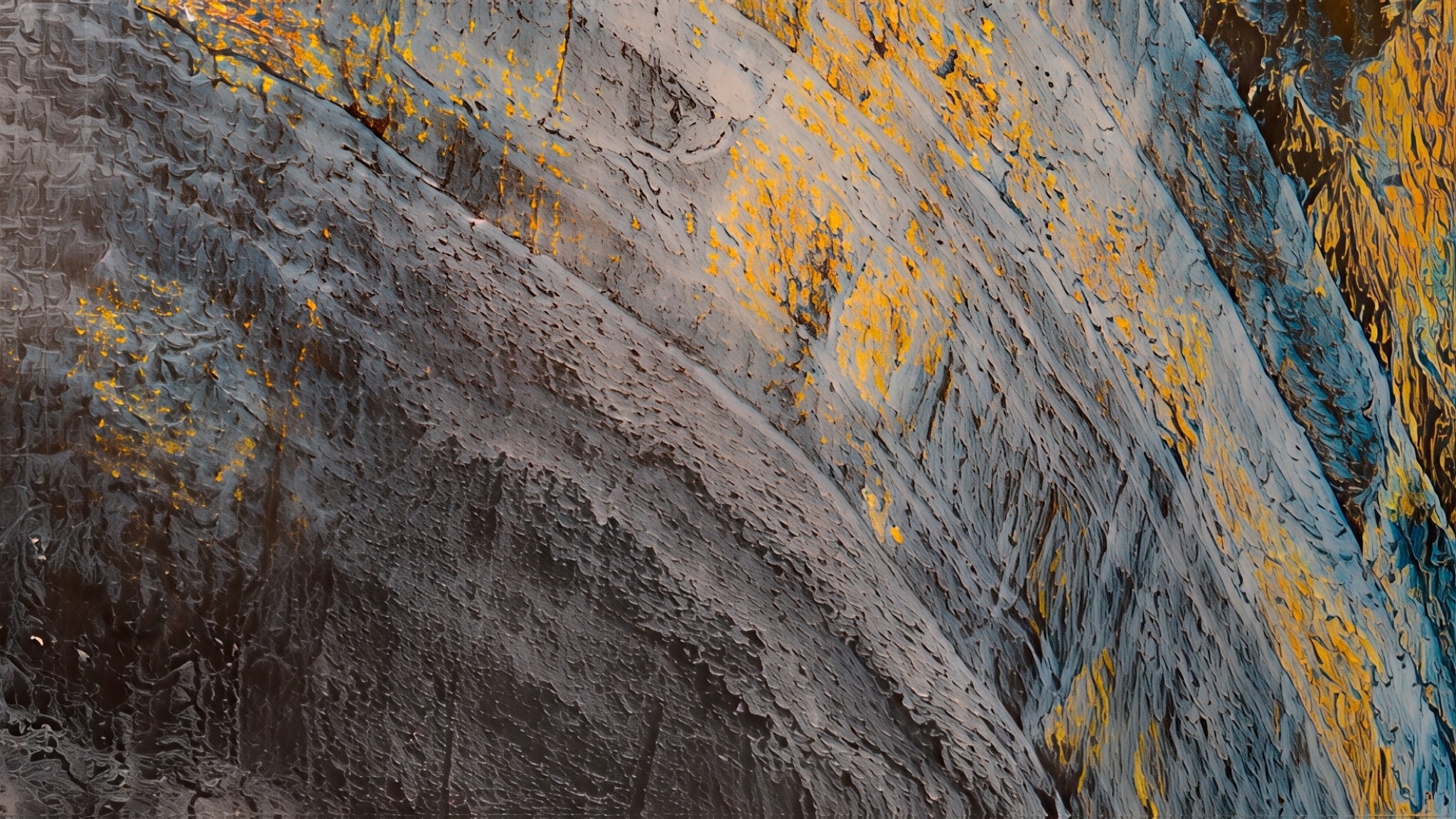 A macro oyster shell study in slate gray, black, teal, and gold